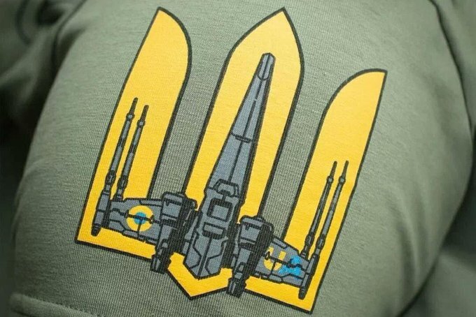 close-up of X-wing patch on Zelenskyy's Star Wars shirt