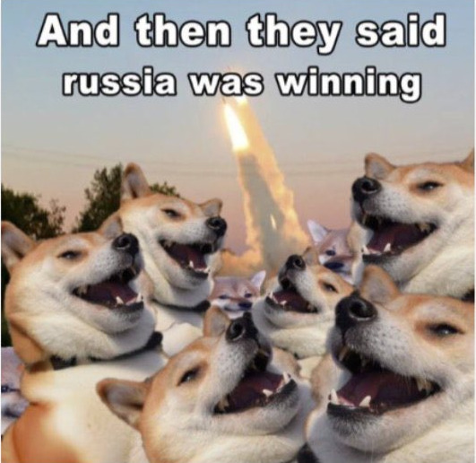 many dogs laughing with a HIMARS launch in background, caption 'And then they said Russia was winning.'