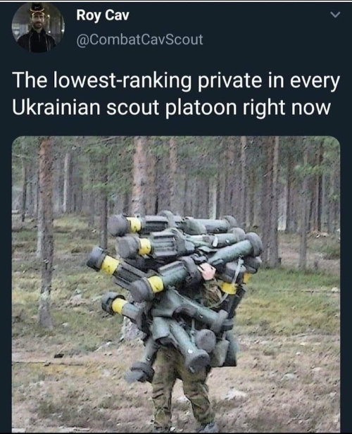 A guy carrying a large number of missile launchers, captioned 'The lowest-ranking private in every Ukrainian scout platoon right now.'