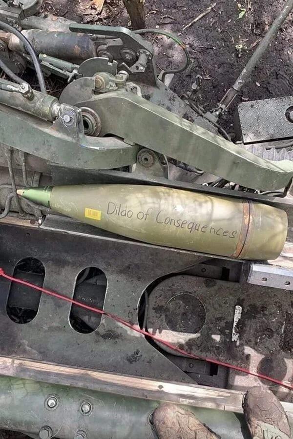Mortar shell with 'Dildo of Consequences' written on it.