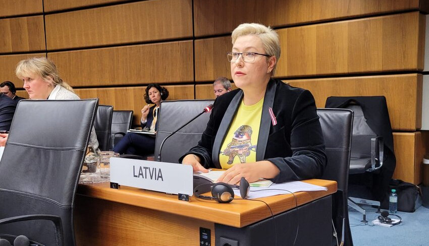 Latvian ambassador to the UN, who's wearing a shirt with a fella on it.