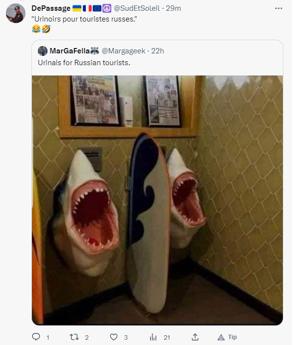 Urinals for Russian tourists: Urinals sculpted to look like sharks that are about to bite people.