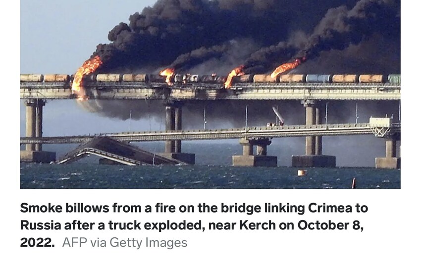 Smoke billows from a fire on the Kerch bridge linking Crimea to Russia after a truck exploded, October 2022. Ukraine admitted they were responsible for this recently.