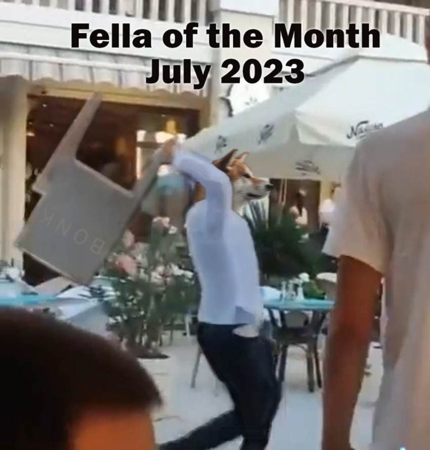 Still image of video where Russian tourists behaved badly in Montenegro and a waiter hit one of them with a chair. Waiter has a fella head shopped in for his real head. Caption 'Fella of the month, July 2023.'