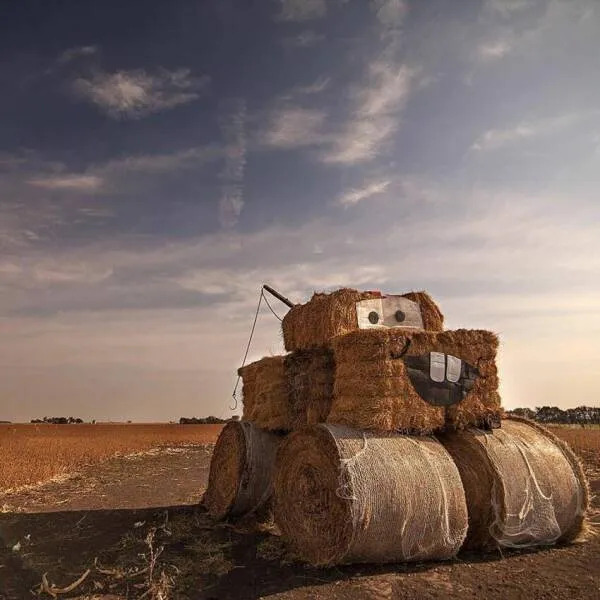 Ukrainians set up decoy tractors to scare Russian tanks: several hay bales put together with a mouth and eyes such that it looks like Mater from 'Cars'.