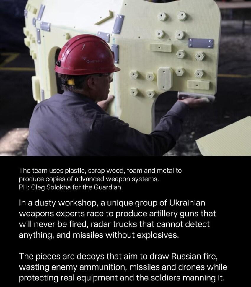 An image of people working in a factory in Ukraine that makes decoys of fighting vehicles.