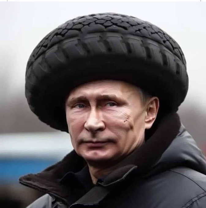 Putin with a tire on his head.