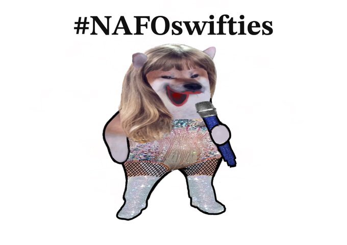 Fella dressed up as Taylor Swift with a microphone, #NAFOswifties.