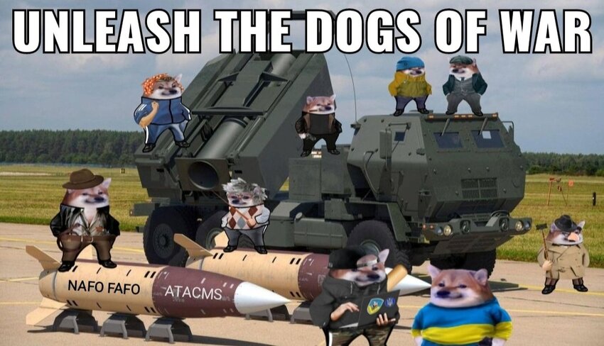 HIMARS with ATACMS surrounded by fellas, a missile says 'NAFO FAFO ATACMS'.
