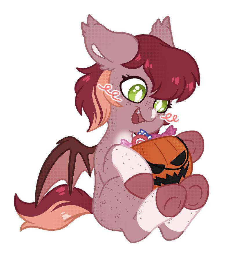 Pony eating candy out of a Halloween pumpkin.