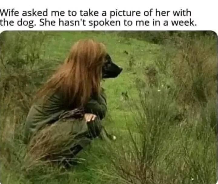 Wife asked me to take a picture of her with the dog. She hasn't spoken to me in a week. (Picture of a woman but there's a dog head over her face.)
