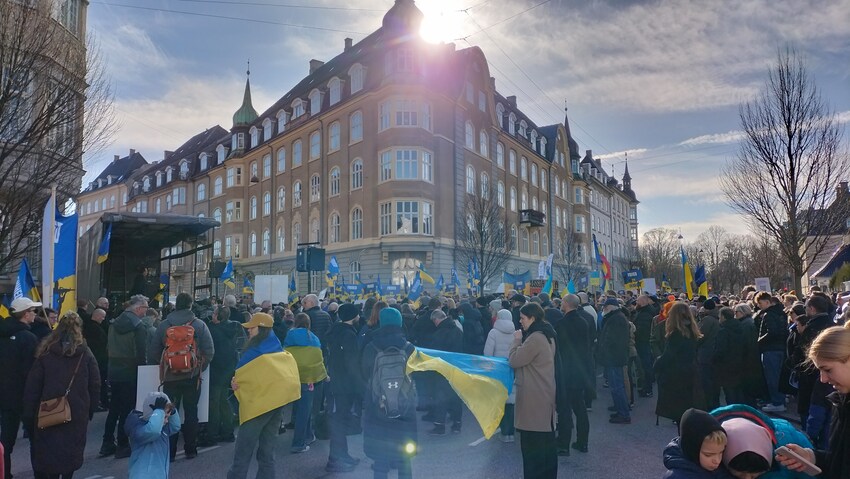 In Denmark, people protest outside the Russian embassy.