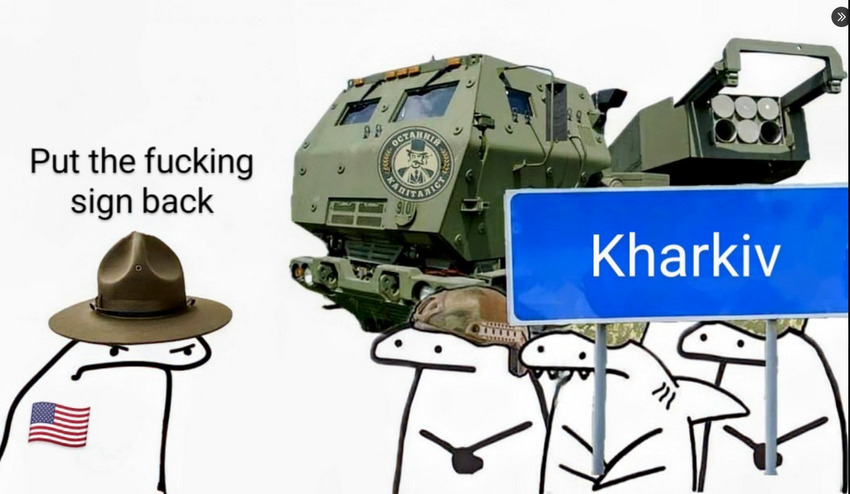 A HIMARS and some Flork of Cows characters with a 'Kharkiv' sign, one Flork says, 'Put the fucking sign back.'
