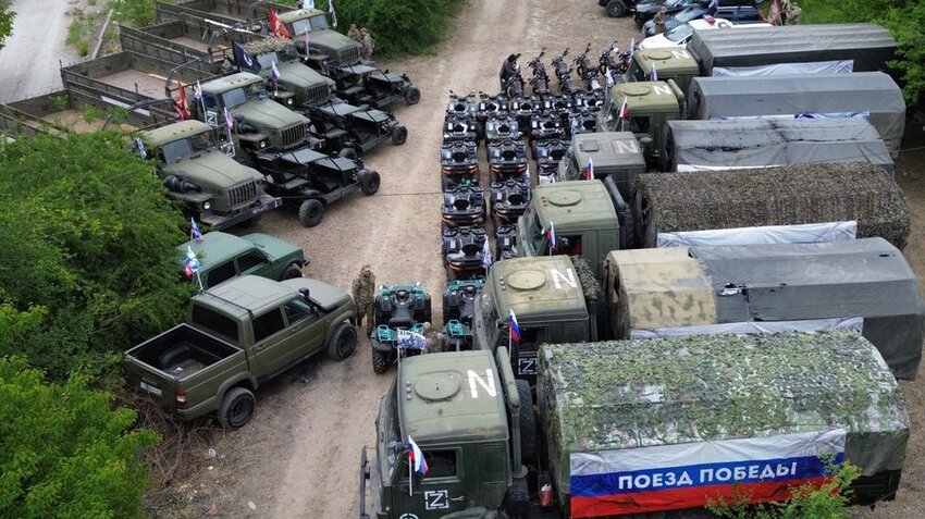 Photo showing a bunch of trucks saying that Russia is running out of combat vehicles.