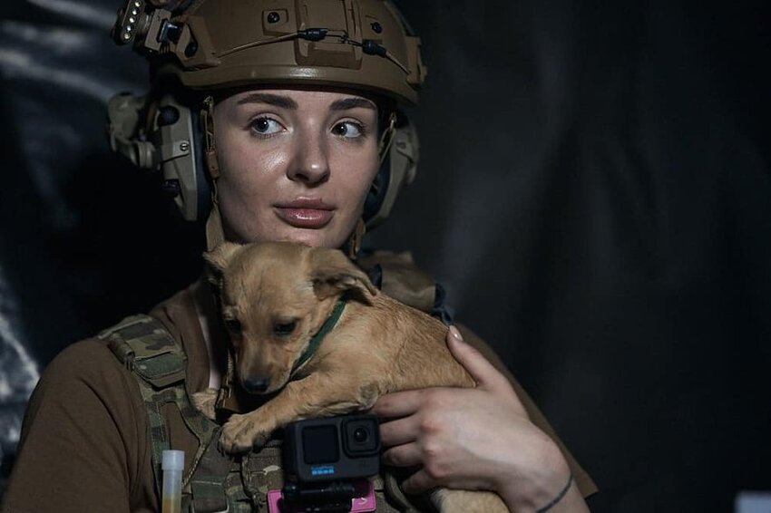Ukrainian Marine with a puppy.