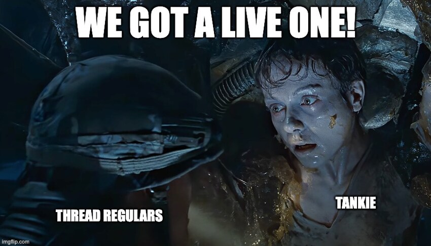 Scene from Aliens where a colonist is about to have an alien burst out of him, captioned 'We got a live one!'