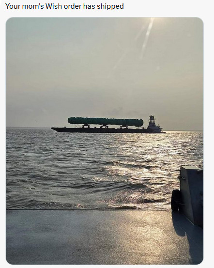 Ship with large cylindrical object on it, caption 'Your mom's wish.com order has shipped.'