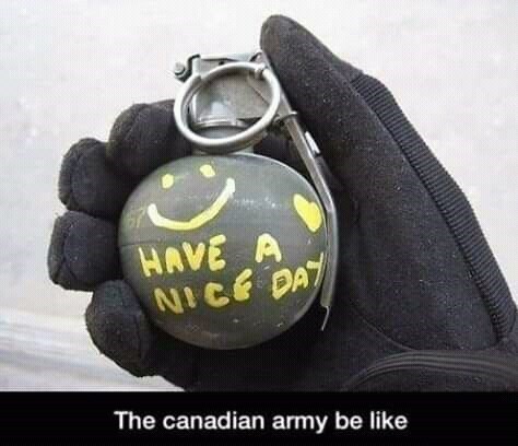 The Canadian Army holds a grenade with 'Have a nice day :-)' on it.