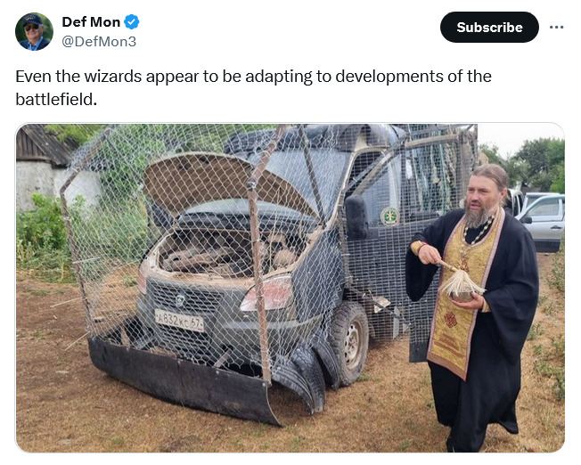 Even the wizards appear to be adapting to developments of the battlefield. (Man who looks like an Orthodox priest in front of a Soviet van with a cope cage.)