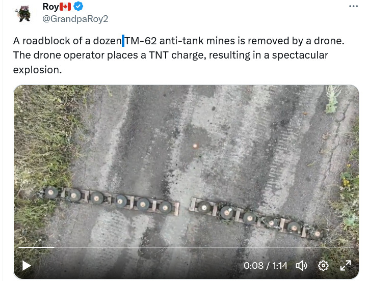 A roadblock of a dozen TM-62 anti-tank mines is removed by a drone.