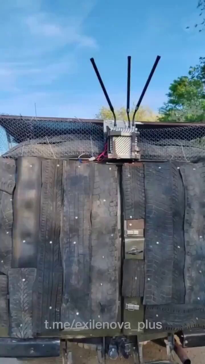 An 'improved' Bukhankha, with cut-up tires nailed to it to provide additional armor or something.