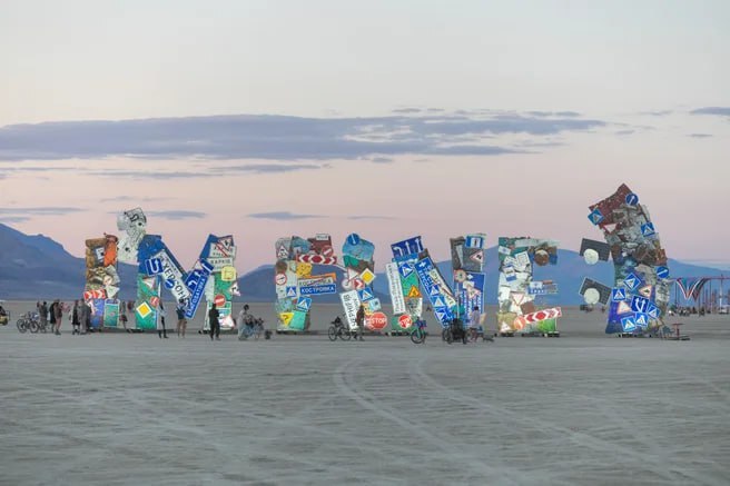 Ukrainian artists made a sign saying 'I'm Fine' at Burning Man in 2024.