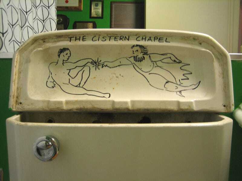 Toilet lid with a drawing mimicking the Sistine Chapel ceiling where God created Adam, titled 'The Cistern Chapel'.